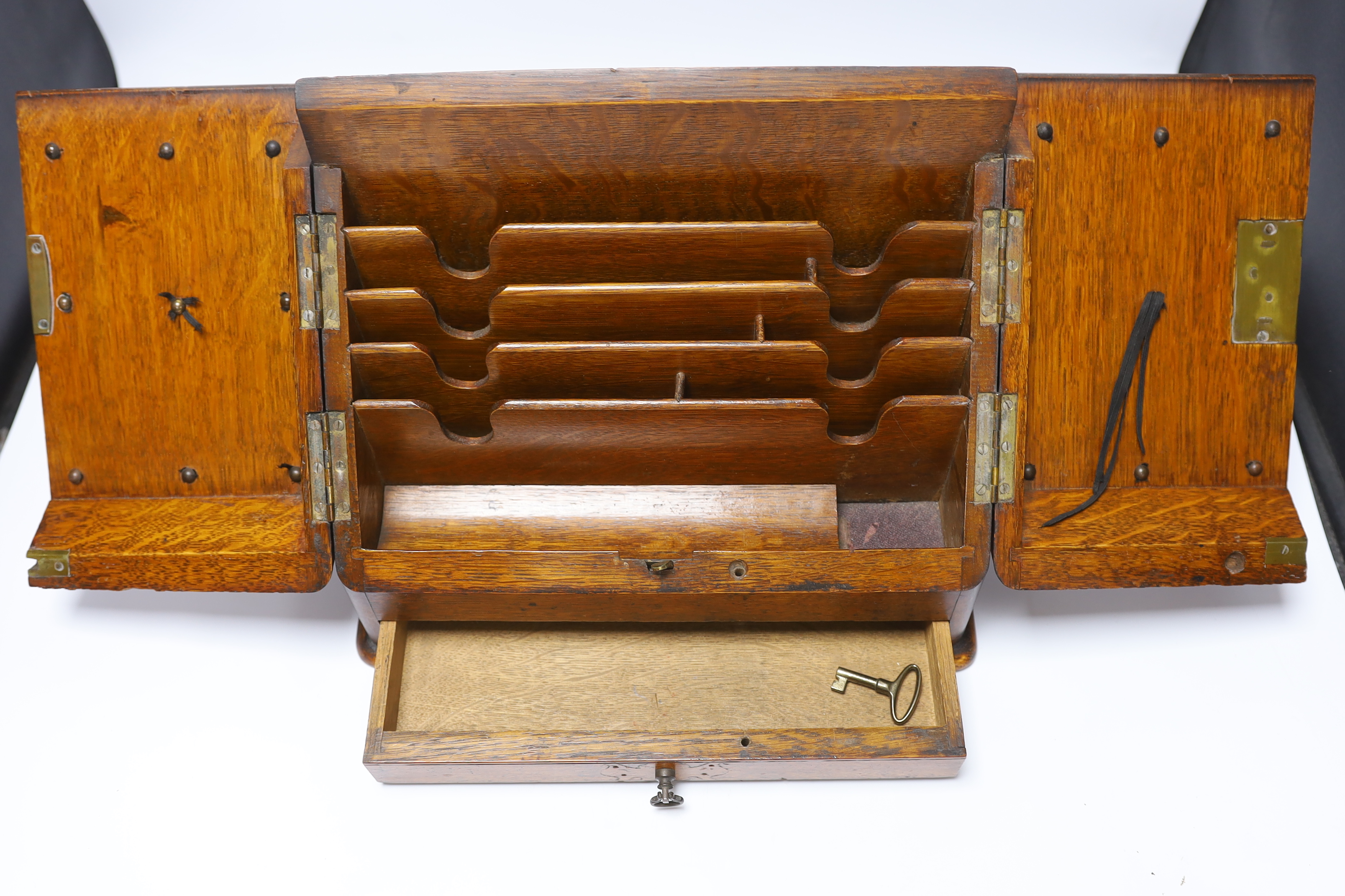 Three boxes; a miniature Polyphon, a stationery box and an inlaid jewellery box, stationery box 26cm high, 32cm wide